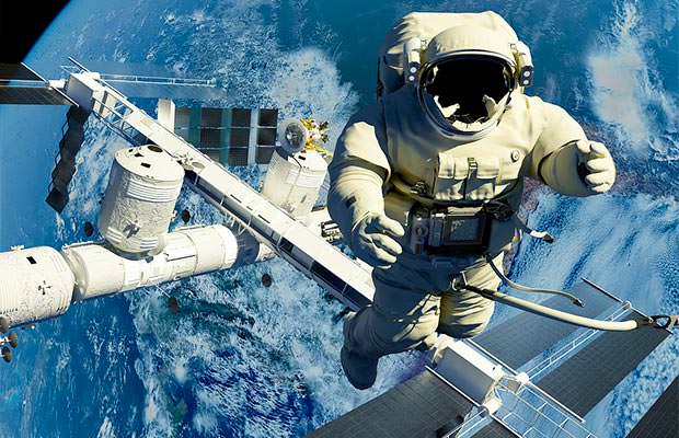 bigstock-The-astronaut-on-a-background--49736744