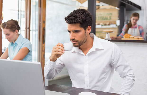 bigstock-Concentrated-young-man-drinkin-61815128