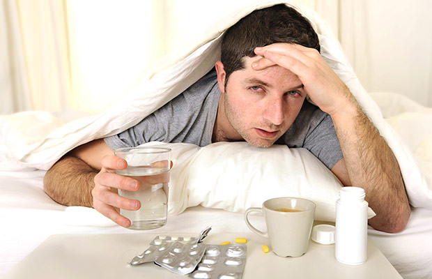 bigstock-Man-With-Headache-And-Hangover-57346412