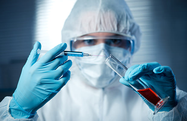 bigstock-Researcher-Preparing-A-Syringe-76111466