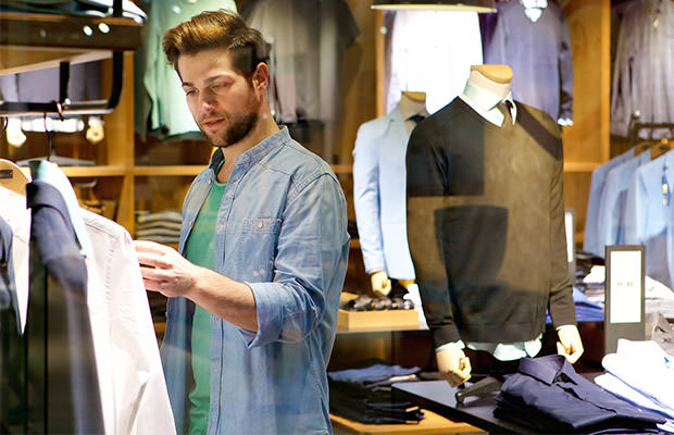 bigstock-Young-Man-Looking-At-Clothes-T-90291125