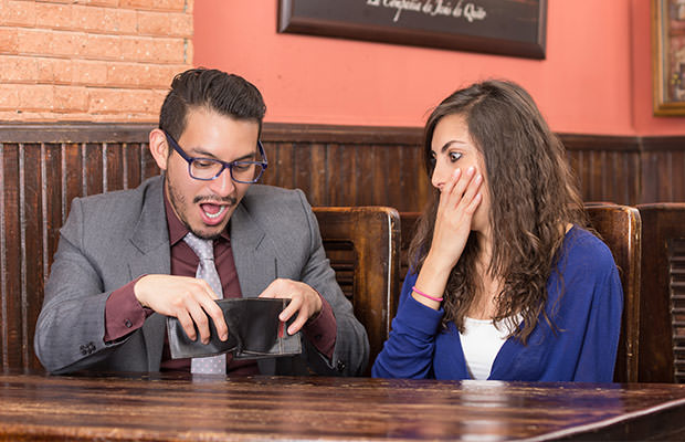 bigstock-young-couple-in-a-restaurant-68825806