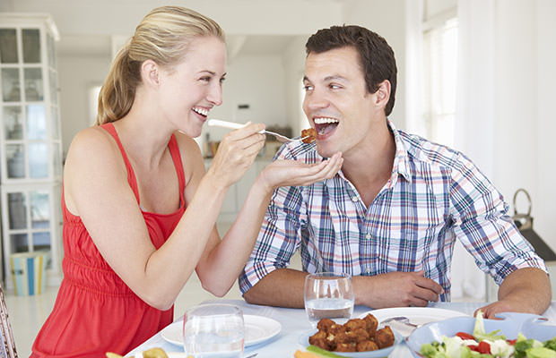 bigstock-Young-Couple-Enjoying-Meal-At--91239773