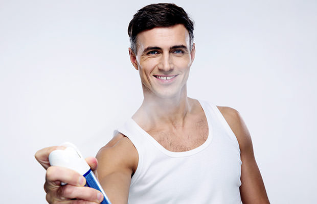 bigstock-Happy-man-spraying-deodorant-o-77792504 - Mens Magazine - Mens ...