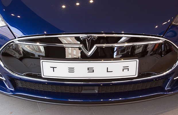 bigstock-Tesla-Car-In-A-Showroom-In-Ams-106016768