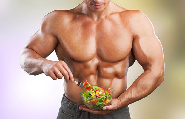 Young woman eating a healthy fruit salad